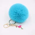 Detail of blue faux fur pompom keychain with pink enamel flamingo and gold lobster clasp - Lake Blue