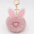 Portachiavi con pompon di pelliccia sintetica a orecchie di coniglio e anello dorato - Stile Portachiavi a Orecchio / Rosa antico