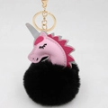 Detailed view of pink leather unicorn charm with a large black pom-pom and gold keychain - Unicorn Keychain / Black