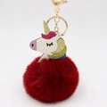 Detail of glitter unicorn keychain with dark red faux fur pompom and golden lobster clasp - Burgundy