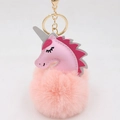 Detailed view of pink unicorn plush ball keychain with silver horn and golden clip - Unicorn Keychain / Pink