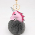 Close-up of pink leather unicorn head and dark grey fluffy pompom with golden metal clip - Unicorn Keychain / Dark Gray