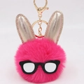 Detail of sequined bunny plush keychain with gold-tone hardware and fluffy pink ears - Rose Red