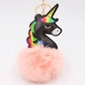 Detail of black unicorn keychain with pink pompom, rainbow stitching and gold metal ring - Pink