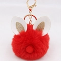 Detail of red fluffy pom pom keychain with gold rabbit ears and lobster clasp for bags - Bunny Ear Pom Pom Keychain / Red
