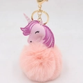 Lindo llavero de unicornio con pompón de pelo rosa y cierre metálico dorado - Llavero Dorado / Rosa