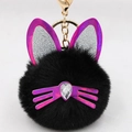 Detail of black plush cat keychain with sequin ears and teardrop crystal nose detail - Black