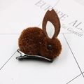 Detail shot of a plush brown bunny hair clip with felt ears and black bead eyes - Coffee Hair Clip