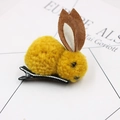 Detailed view of yellow plush bunny hair clip with brown felt ears and black metal alligator clip - Yellow Hair Clip