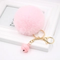 Porte-clés pompon en fausse fourrure rose avec clochette dorée et boucle métallique - Rose Clair