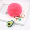 Detail of rose red faux fur pompom keychain with gold lobster clasp and avocado charm - Avocado Keychain / Watermelon red