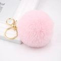 Portachiavi con pompon in ecopelliccia rosa da 8cm e chiusura dorata per borse - Portachiavi d'Oro / Rosa Chiaro