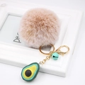 Detail of soft faux fur pom pom and 3D resin avocado charm on golden metal keychain - Avocado Keychain / Mixed Khaki
