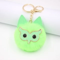 Lichtgroene glitter uil sleutelhanger van imitatiebont met gouden metalen sluiting - Gouden Sleutelhanger / Fluorescerend Groen