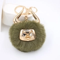 Army green bull faux fur pompom keychain with golden horns and metal bull head charm - Gold Keychain / Camo Green