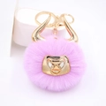 Detail of pink faux fur bull keychain with gold metal horns and lobster clasp on white - Gold Keychain / Taro Purple