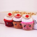 Three cute cupcake keychains with sparkling rhinestones in red, brown and pink - Random Color
