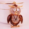 Sparkling owl keychain with rhinestones and brown enamel finish on gold metal - Coffee