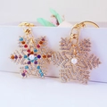 Porte-clés flocon de neige doré avec cristaux colorés et perle pour sacs à main - Couleur Aléatoire