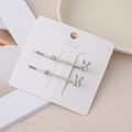 Dettaglio di fermagli per capelli a forma di coniglio con strass lucidi e base argento - Coniglio Argento