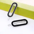 Detail of two black enamel oval hair clips on silver metal base for women's styling - Silver Base Black