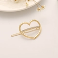 Golden heart hair clip with sparkling white rhinestones and textured metal finish - Heart