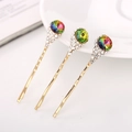 Set di tre fermagli per capelli dorati a fiore con cristalli e strass luccicanti - Multicolore