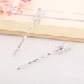 Detailed view of silver hair clips featuring sparkling rectangular zircon gemstones - Silver Geometric Style