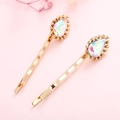 Elegant gold wavy hair clips with colorful teardrop crystals on a pink background - Multi-White Rhinestone Style / Gold (Multi-White)