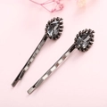 Elegant pair of wave-shaped hair clips with grey water drop crystal in black finish - Grey Rhinestone Style / Gun Black (Grey)