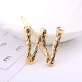 Elegant gold-plated alloy letter W hair clip with textured metal finish for women - Letter W