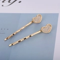 Elegant gold heart hair clips set with pearls and diamonds for women's hairstyling - Heart