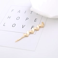Pince à cheveux minimaliste dorée avec cinq motifs de cœur sur métal poli pour femme - Coeur 2