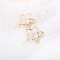 Barrette à cheveux étoile dorée avec perles blanches et petits strass brillants - Pentagramme