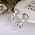 Paire de barrettes à cheveux en alliage argenté avec strass aurore et design filigrane - Nœud Papillon Creux - Argent Platine
