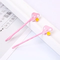 Dettaglio di fermagli per capelli a fungo rosa con perle sintetiche e smalto - Fungo Bianco