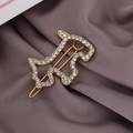 Eleganter goldener Scottie Hund Haarclip mit glitzernden Strasssteinen auf Seidenstoff - Hohler Strass Hund
