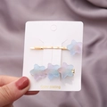 Détail de barrettes étoiles colorées avec dégradé arc-en-ciel sur supports en métal doré - Étoile Dégradé Bleu