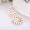 Elegante set di due fermagli per capelli dorati con design circolare in perle bianche - Rotondo Oro