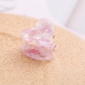 Close-up of pink and white marble textured acetate heart-shaped hair claw clip accessory - Light Purple White