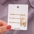 Dreiteiliges goldenes Haarklammer-Set mit pinkem Schmetterling und glitzerndem Strass - Schmetterling Rosa