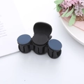 Detailed view of a matte black hair claw clip with blue circular accents for daily styling - Large / Blue Black (3 Pieces Decor)