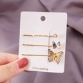 Dreiteiliges goldenes Schmetterlings-Haarspangen-Set mit Strass auf Displaykarte - Schmetterling Schwarz