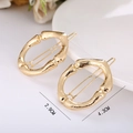 Set of two gold alloy hair clips with bamboo texture, 4.3cm long and 2.9cm wide - Letter O