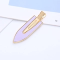 Detailed view of lavender purple leather hair clip with elegant gold metal edges and grip - Purple