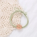 Cute Korean daisy flower elastic hair tie with pink enamel floral and green bow detail - Yellow-Green