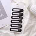 Set de 6 pinzas rectangulares negro mate dispuestas en una tarjeta de marca blanca - Negro Mate
