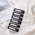 Set of 6 minimalist matte black rectangular BB hair clips on a white display card - Matte Black