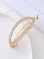 Eleganter goldener ovaler Haarclip mit funkelnden weißen Strasssteinen für Frisuren - Zirkonia Stil / Gold