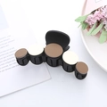 Matte black claw clip with brown and cream gradient discs on an aesthetic book background - Large / Khaki Gradient (5 Pieces Decor)